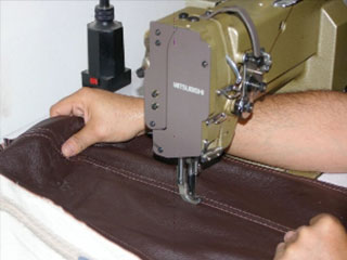 Couture cuir sur canapé et fauteuil
