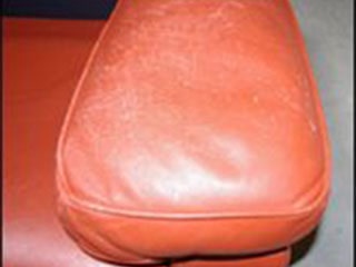 Usure de l'accoudoir en cuir